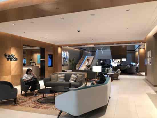 Modern lobby at Tradewinds, The American Club Singapore, ideal for meetings and events.