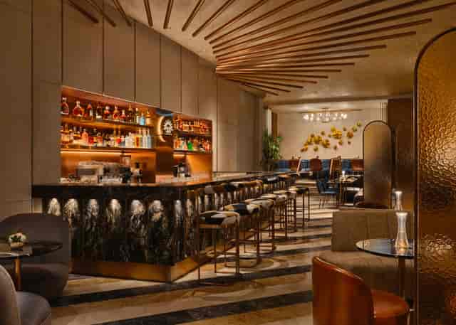 Terrace Bistro & Bar at Tanglin Club, elegant bar area for networking events and cocktail receptions.