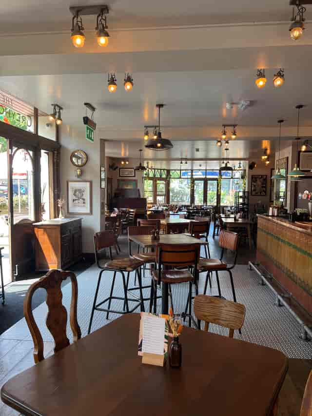 Charming restaurant venue hire with vintage decor for intimate gatherings and meetings.