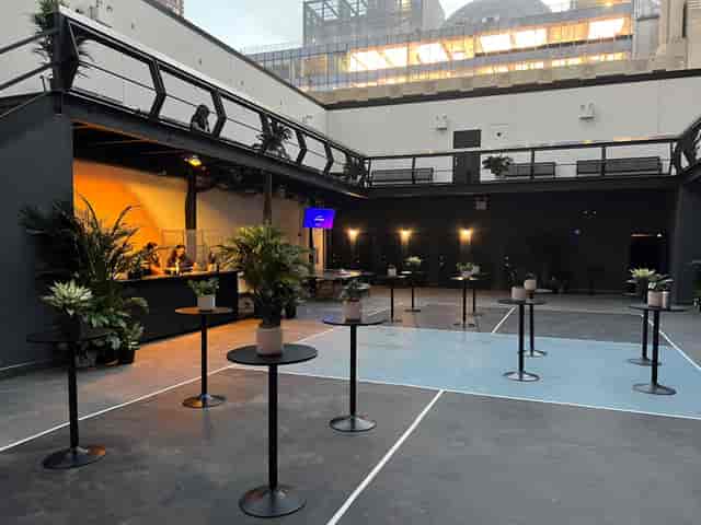 Main Room at Terminal 5 with stylish planters, ideal for networking events and receptions.