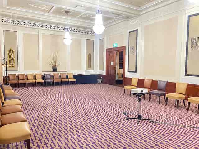 Private dining suite with elegant decor, ideal for meetings and workshops.