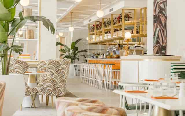 Modern restaurant venue with vibrant decor for cocktail receptions and networking events.
