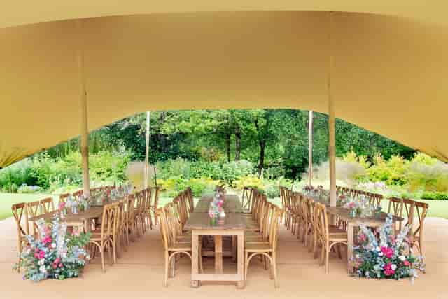 Elegant stretch tent marquee for garden weddings and upscale outdoor events at Leeds Castle.
