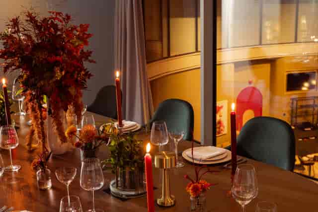 Elegant dining table in Creative Room 6, perfect for intimate events and dinner parties.