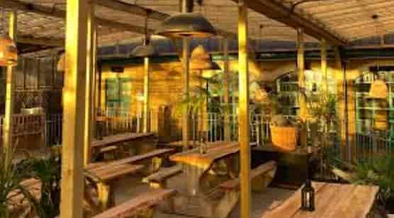 Vibrant outdoor venue at The Pub in Pacific Tavern for casual meetings and events.