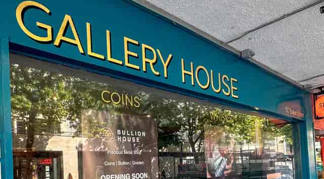 Gallery House storefront with "Opening Soon" sign for coin and bullion events.