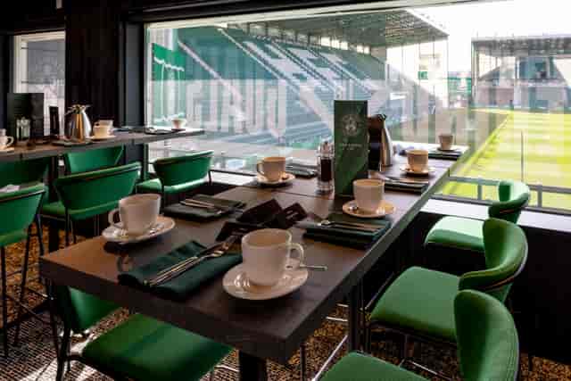 Stylish event space at Hibernian FC with field view, ideal for corporate meetings and gatherings.