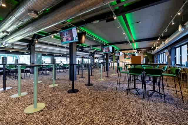 Versatile event space at Hibernian FC with modern decor for corporate and social gatherings.