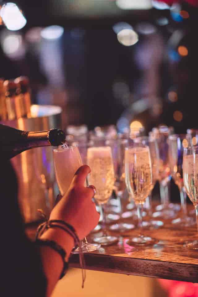 Champagne flutes at Boom Battle Bar, perfect for weddings and corporate events.