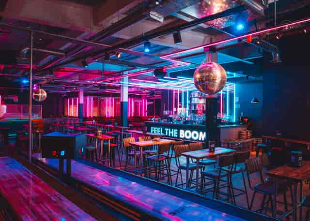 Vibrant event space with disco ball for private hire in Boom Battle Bar Leeds.