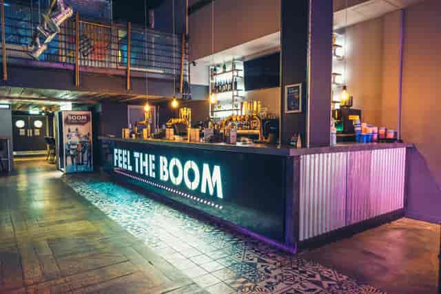 Vibrant bar area in Boom Battle Bar Birmingham for networking events and social gatherings.