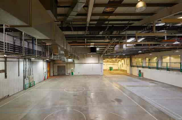 Spacious industrial auditorium in London North Studios, ideal for events and exhibitions.