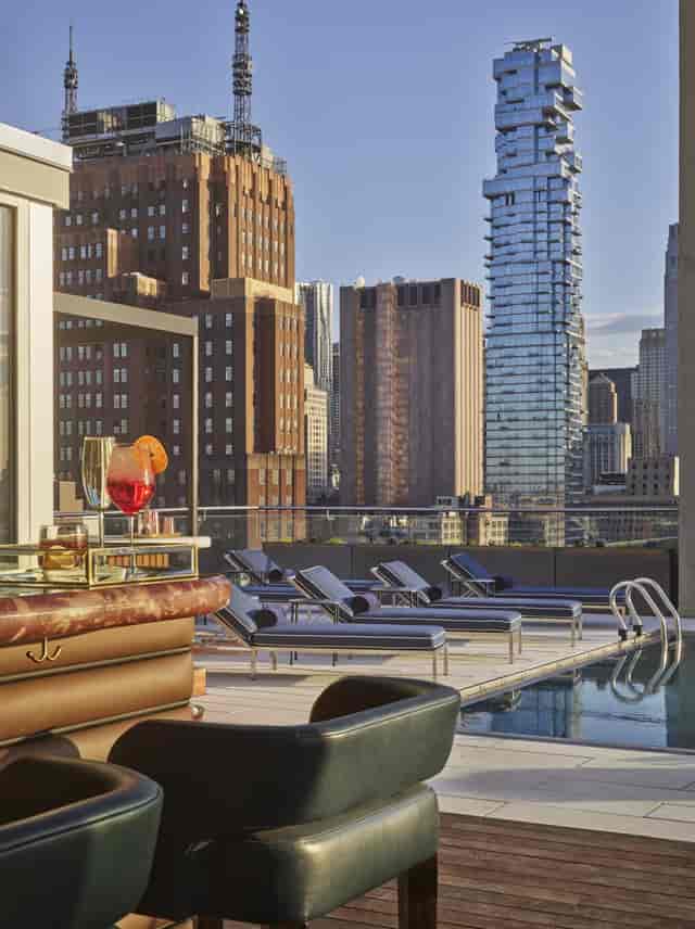 Rooftop terrace at ModernHaus SoHo with city skyline, perfect for upscale events and gatherings.