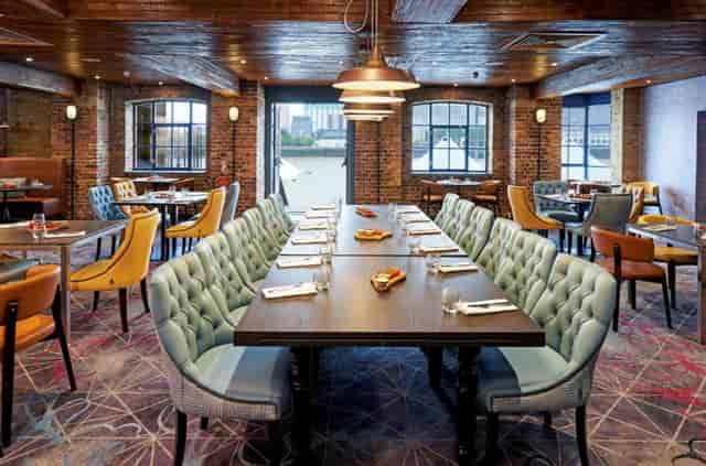 Elegant banquet hall at DoubleTree London, ideal for meetings and events with warm lighting.
