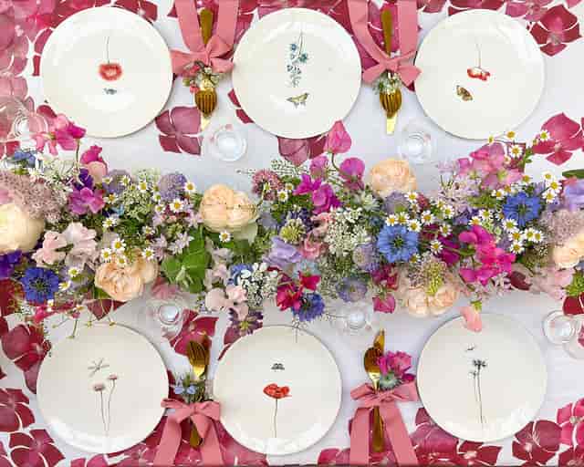 Elegant tablescape with floral centerpiece for celebrations and gatherings.