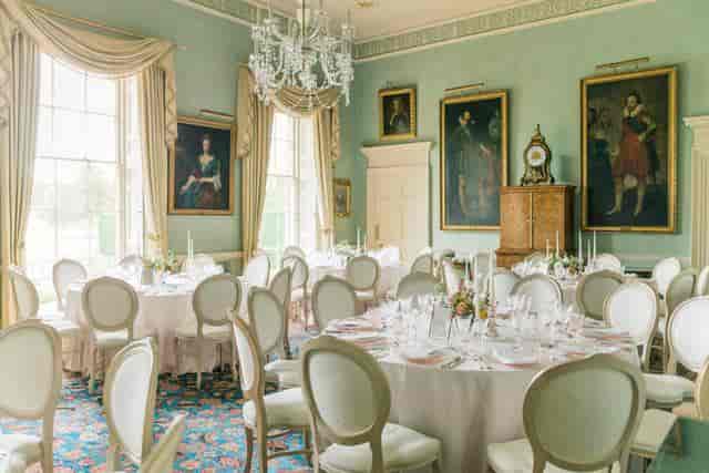 Elegant garden marquee with pink linens, perfect for weddings and upscale events.