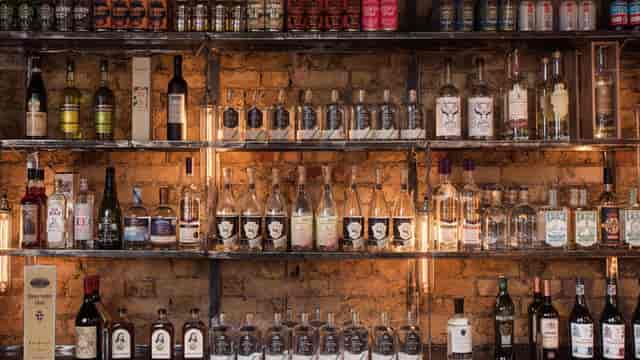 Bottle Shop in The Distillery London, rustic bar with spirits, perfect for networking events.