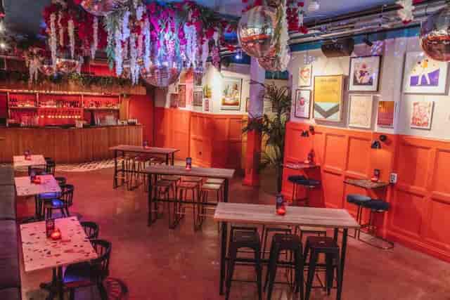 Vibrant Multiroom Event Space in Colours Hoxton, ideal for networking and celebrations.
