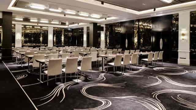 Classroom-style Crystal Room at The May Fair for executive conferences and professional meetings.