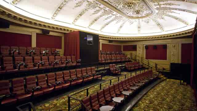 Alamo Drafthouse auditorium with plush seating for film screenings and corporate events.