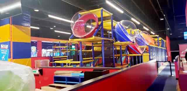 Kids Play Zone at Round1 USA with colorful slides for family-friendly events and parties.