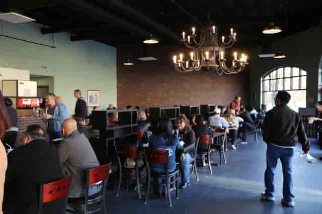 Event space at Sophie's Mediterranean Grill, warm lighting, networking and meetings.