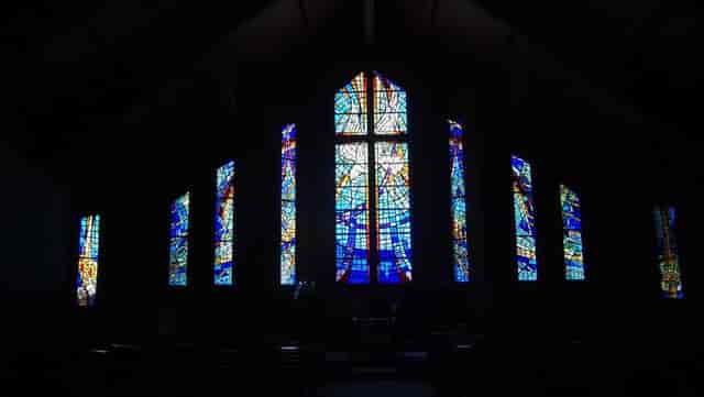 Stained glass windows in Prince of Peace Church, perfect for weddings and gatherings.