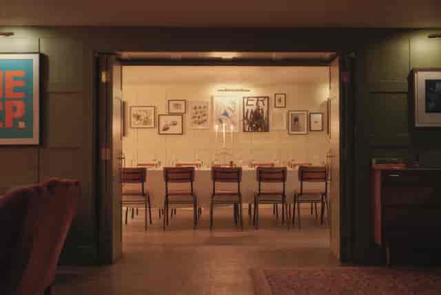 Sophisticated dining space with elegant table setting for upscale events and private dinners.