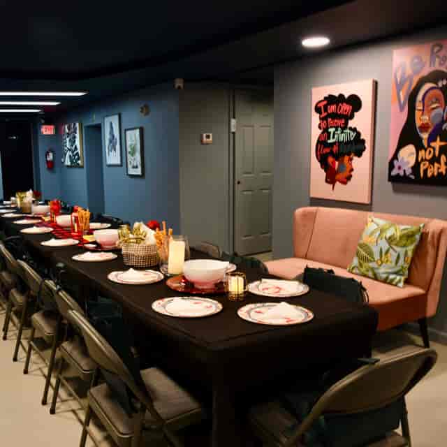 Private workspace in Creator's Village Newark, elegant dining table for networking events.