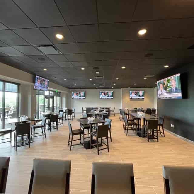 Versatile event space at The Hill Tavern with modern decor for meetings and gatherings.