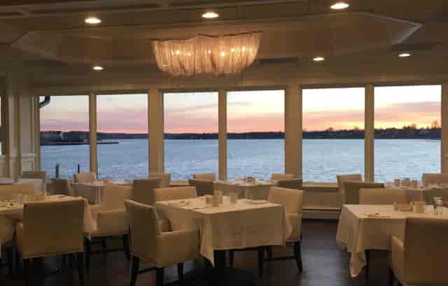 Elegant dining area in South Suite, Oyster Point Hotel, perfect for upscale events.