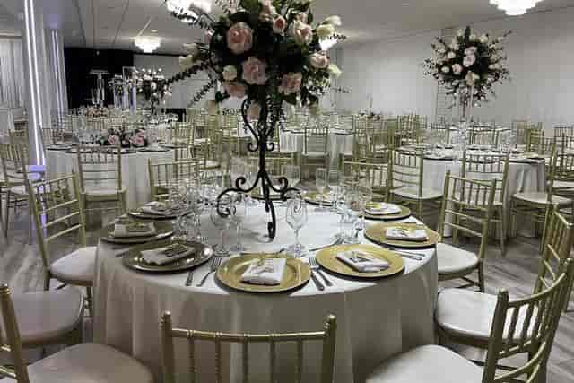 Elegant banquet hall in Casablanca with white tables, perfect for weddings and corporate events.