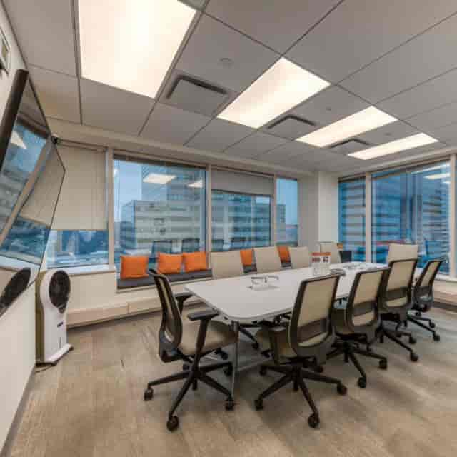 Modern conference room with ergonomic chairs in Union City coworking space.