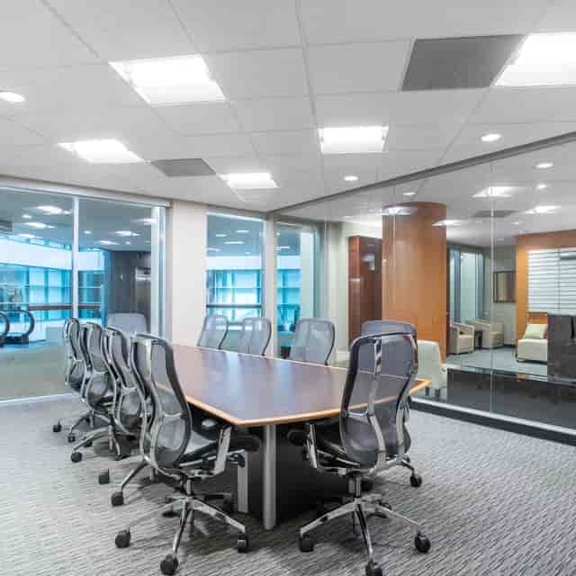 Modern Fremont Meeting Room with large table, ideal for conferences and presentations.
