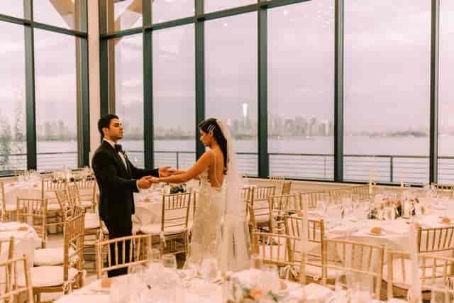 Elegant Hudson House balcony with waterfront view, perfect for weddings and upscale events.