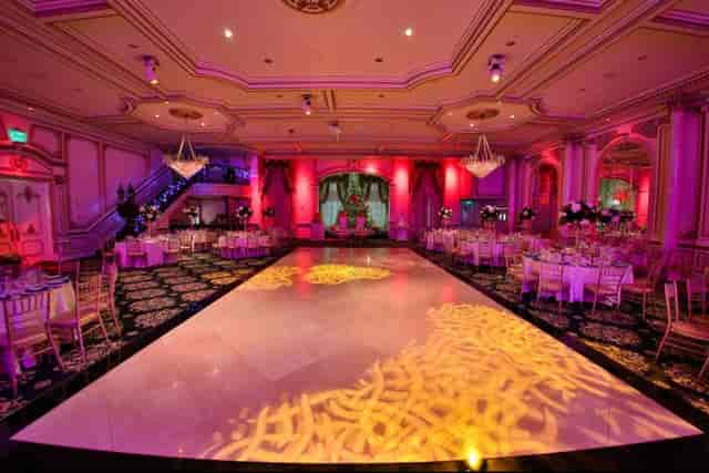 Elegant ballroom with spacious dance floor, ideal for weddings and galas.
