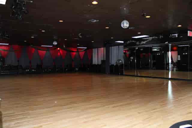 Spacious Imperial Ballroom with polished floors, perfect for dance events and gatherings.