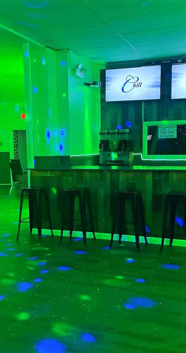 Vibrant Montclair Chill event space with sleek bar, ideal for networking and parties.