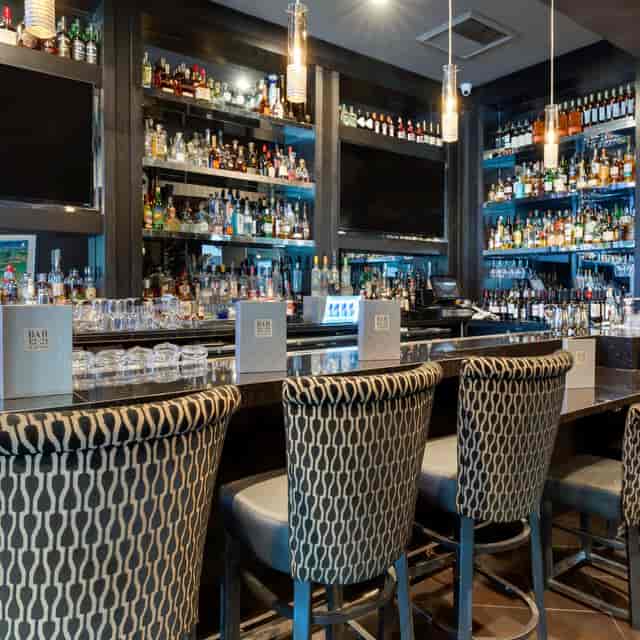 Sleek bar at Morton's The Steakhouse, ideal for networking events and cocktail receptions.