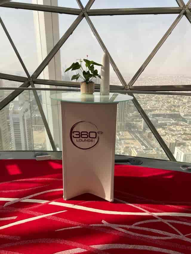 Sleek event space with panoramic views, ideal for corporate gatherings and networking.