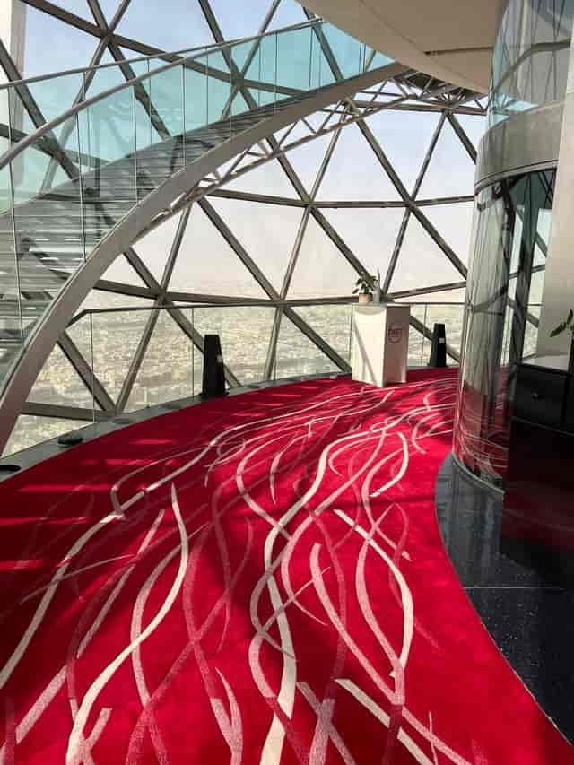 360 Lounge at The Globe, Riyadh: modern event space with panoramic views and red carpet.