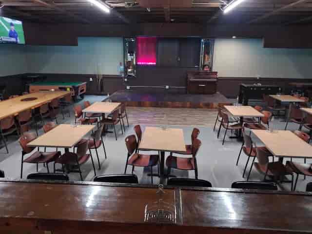 Grocery store event space with flexible seating for meetings and gatherings in Westside Live.