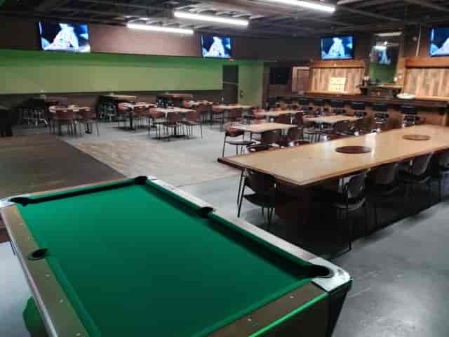 Grocery store event space with versatile seating for team-building and social gatherings.