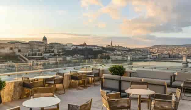 Half Terrace rooftop venue with city views, ideal for upscale events and cocktail receptions.