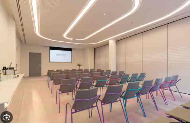 Modern meeting room with stylish chairs for workshops at Park Inn Amsterdam.