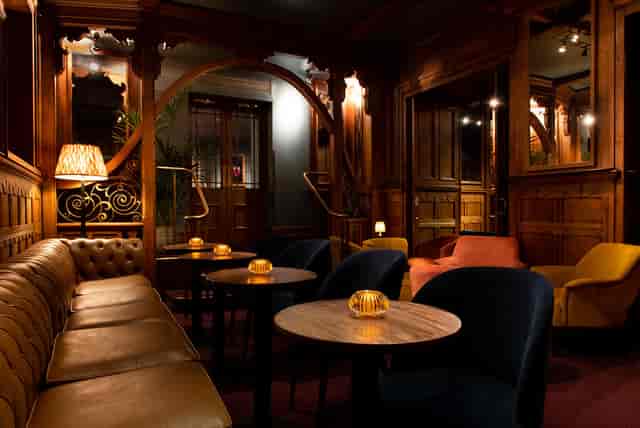 Stylish lounge at The American Bar, ideal for networking events and cocktail receptions.