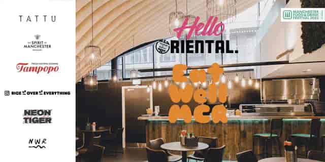 Modern basement event space with warm wood accents, ideal for meetings and gatherings.