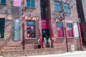FunnyBoyz Liverpool venue with rustic brick facade, perfect for events and gatherings.