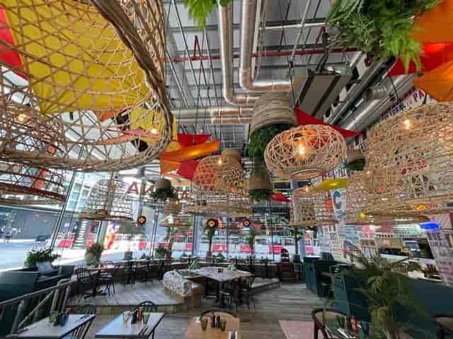 Vibrant Cabana St Giles venue with unique decor for casual meetings and events.
