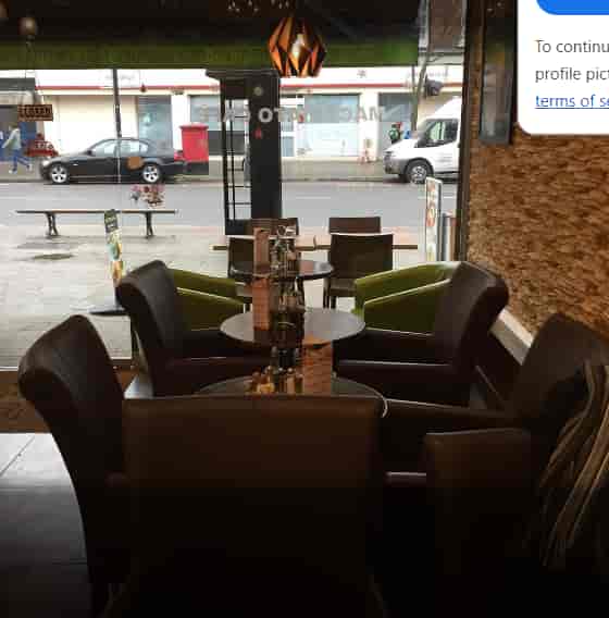 Cozy café seating at Machiato Coffee House, ideal for networking and brainstorming events.